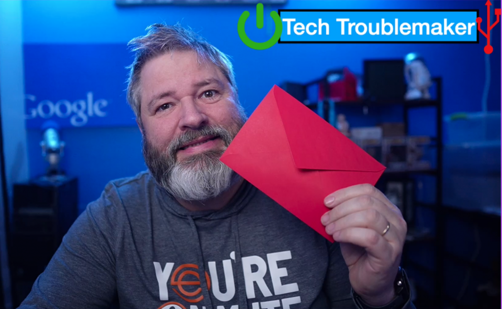 Tech Troublemaker with an envelope
